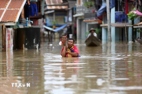 [Photo] Hàng nghìn người dân Myanmar phải sơ tán khẩn cấp vì lũ lụt
