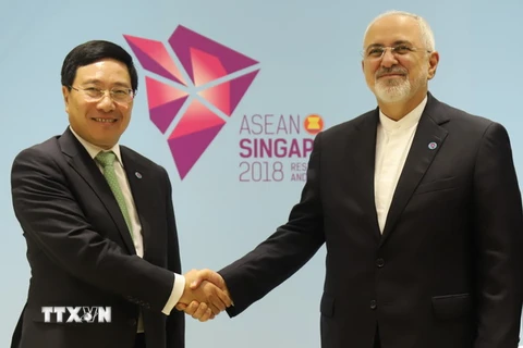 Phó Thủ tướng, Bộ trưởng Ngoại giao Phạm Bình Minh và Bộ trưởng Ngoại giao Iran Mohammad Javad Zarif. (Ảnh: Xuân Vịnh/TTXVN)