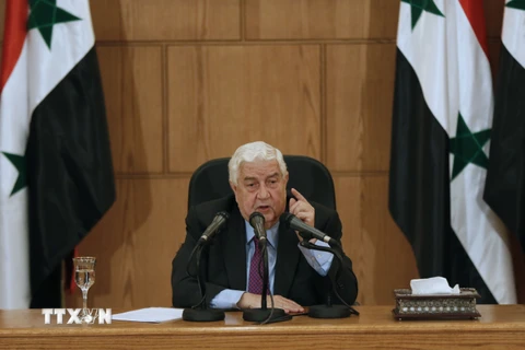 Ngoại trưởng Syria Walid Muallem phát biểu trong cuộc họp báo tại Damascus. (Nguồn: AFP/TTXVN)