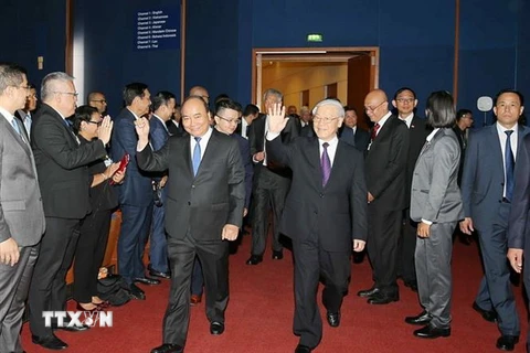 Tổng Bí thư Nguyễn Phú Trọng và Thủ tướng Nguyễn Xuân Phúc đến dự Phiên khai mạc toàn thể WEF ASEAN 2018.(Ảnh: Trí Dũng/TTXVN)