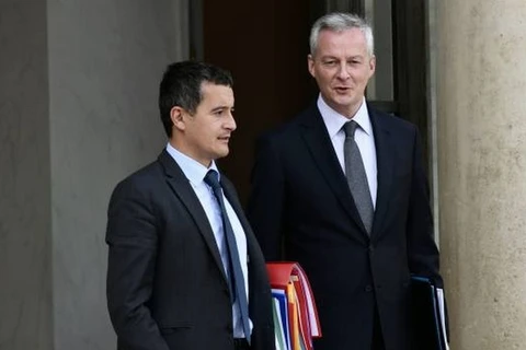 Bộ trưởng Kinh tế Bruno Le Maire (phải) và Bộ trưởng Ngân sách công Gérald Darmanin. (Nguồn: AFP)