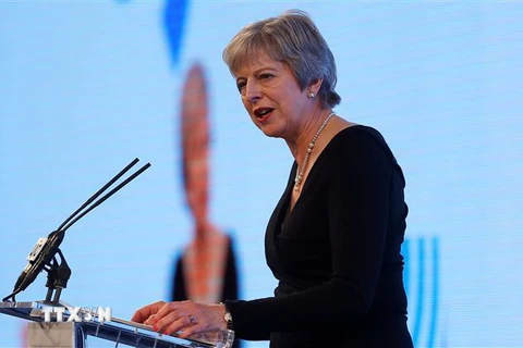 Thủ tướng Anh Theresa May phát biểu tại một sự kiện ở London. (Ảnh: AFP/TTXVN)