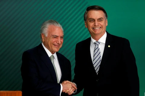 Tổng thống Brazil Michel Temer và Tổng thống đắc cử Jair Bolsonaro. (Nguồn: Reuters)