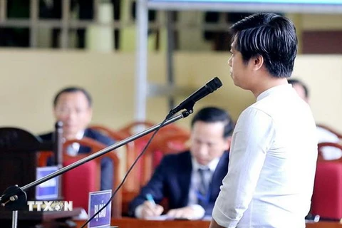 Bị cáo Phạm Quang Thành trả lời trước tòa. (Ảnh: Trung Kiên/TTXVN)