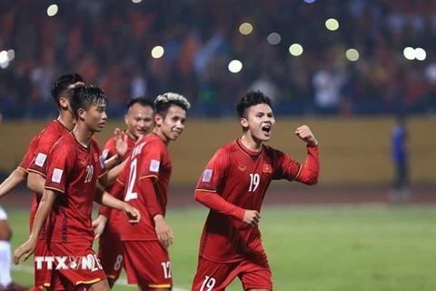 Quang Hải (số 19) và các cầu thủ Việt Nam trong trận thắng Campuchia 3-0. (Ảnh: Trọng Đạt/TTXVN)