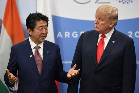 Tổng thống Mỹ Donald Trump và Thủ tướng Nhật Bản Shinzo Abe tại Argentina. (Nguồn: AFP)