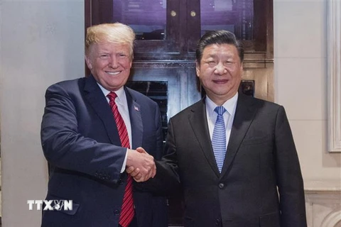 Chủ tịch Trung Quốc Tập Cận Bình (phải) và Tổng thống Mỹ Donald Trump trong cuộc gặp tại Buenos Aires, Argentina ngày 1/12/2018. (Ảnh: THX/TTXVN)