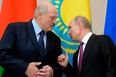 Tổng thống Nga Vladimir Putin và người đồng cấp Belarus Alexander Lukashenko. (Nguồn: AFP)