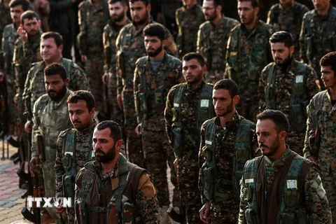 Các tay súng YPG tại thành phố Qamishli, Syria. (Ảnh: AFP/TTXVN)