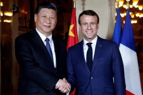 Tổng thống Pháp Emmanuel Macron và Chủ tịch Trung Quốc Tập Cận Bình. (Nguồn: AFP)