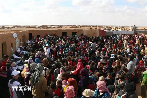 Người tị nạn Syria tại trạn tị nạn Rukban. (Ảnh: AFP/TTXVN)