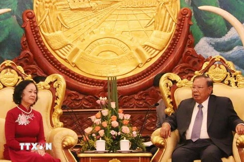 Trưởng Ban Dân vận Trung ương Trương Thị Mai hội kiến Tổng Bí thư, Chủ tịch nước Lào Bounnhang Volachit. (Ảnh: Xuân Tú/TTXVN)