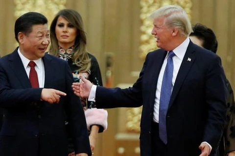 Chủ tịch Tập Cận Bình và Tổng thống Mỹ Donald Trump trong cuộc gặp hồi tháng 9/2017. (Nguồn: Reuters)