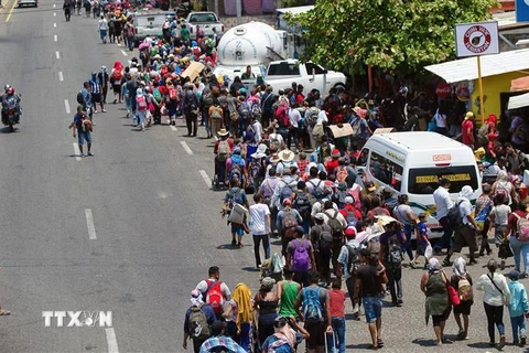 Người di cư trong hành trình tới Mỹ tại Huehuetan, bang Chiapas, Mexico, ngày 15/4/2019. (Ảnh: AFP/TTXVN)