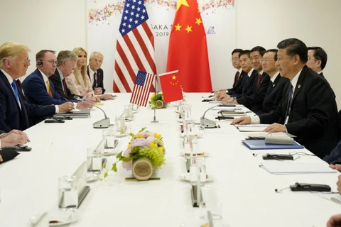 Tổng thống Mỹ Donald Trump và Chủ tịch Trung Quốc Tập Cận Bình gặp nhau tại Osaka. (Nguồn: Reuters)
