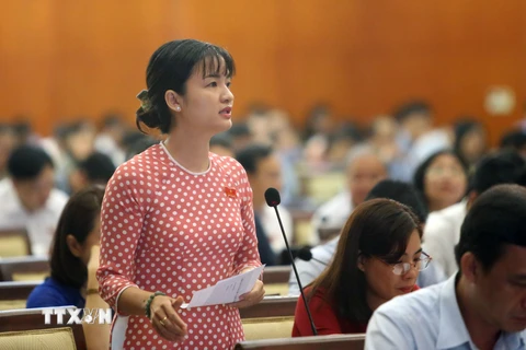 Đại biểu thảo luận về tình hình kinh tế-xã hội của Thành phố Hồ Chí Minh. (Ảnh: Thành Chung/TTXVN)
