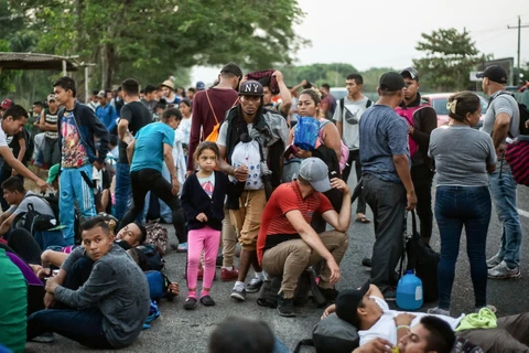 Người di cư Trung Mỹ trong hành trình tới Mỹ tại khu vực Tapachula, bang Chiapas, Mexico. (Ảnh: AFP/TTXVN)