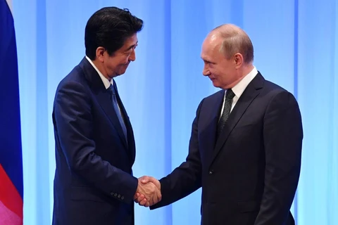 Tổng thống Nga Putin và Thủ tướng Nhật Bản Abe. (Nguồn: Reuters)