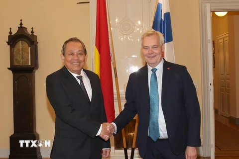 Phó Thủ tướng thường trực Trương Hòa Bình gặp Thủ tướng Phần Lan Antii Rinne. (Ảnh: Công Thuận/TTXVN)