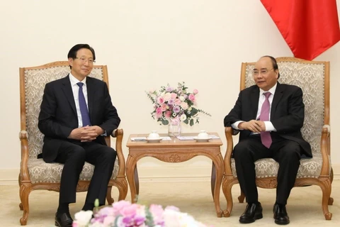 Thủ tướng Nguyễn Xuân Phúc tiếp Bộ trưởng Bộ Nông nghiệp nông thôn Trung Quốc Hàn Trường Phú. (Ảnh: Văn Điệp/TTXVN)