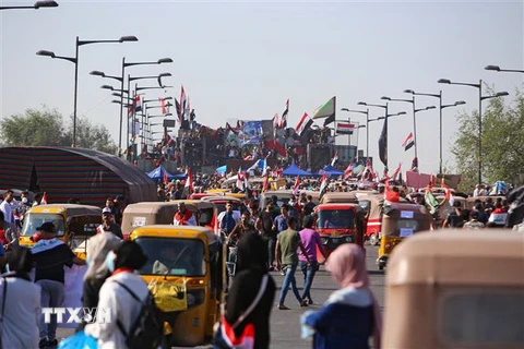 Biểu tình tại Baghdad, Iraq, ngày 4/11. (Ảnh: AFP/TTXVN)