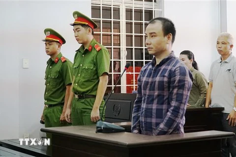 Bị cáo Trần Đình Trung tại phiên tòa. (Ảnh: Thanh Tân/TTXVN)