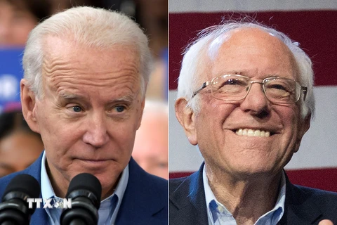Cựu Phó Tổng thống Mỹ Joe Biden (trái) và ứng viên tranh cử tự do, Thượng nghị sỹ Bernie Sanders. (Ảnh: AFP/TTXVN)