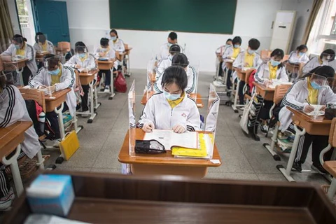 Học sinh tại một trường học ở Vũ Hán, tỉnh Hồ Bắc, Trung Quốc. (Ảnh: THX/TTXVN)