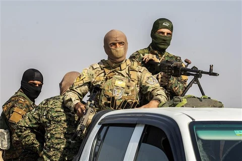 Các lực lượng dân chủ Syria (SDF). (Ảnh: AFP/TTXVN)