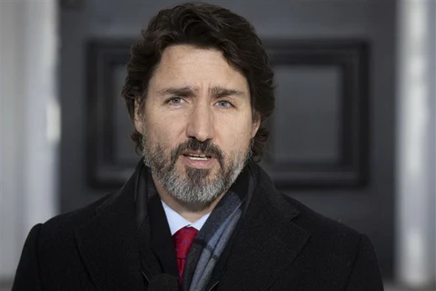 Thủ tướng Justin Trudeau phát biểu tại cuộc họp báo ở Ottawa, Canada. (Ảnh: AFP/TTXVN)