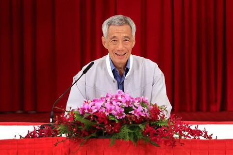 Thủ tướng Lý Hiển Long tại cuộc họp báo công bố cải tổ nội các ngày 23/4. (Ảnh: TTXVN phát)