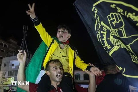 Người dân Palestine ở Gaza hò reo ăn mừng lệnh ngừng bắn