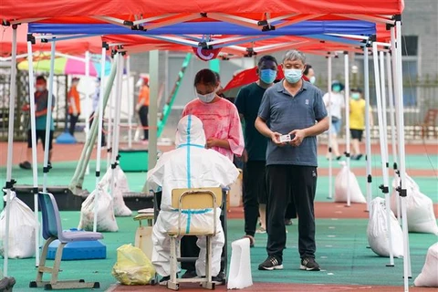 Quan chức Trung Quốc kêu gọi “bít” các lỗ hổng trong kiểm soát dịch