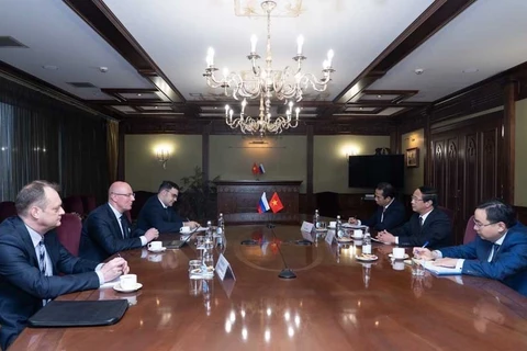 Phó Thủ tướng Chính phủ Lê Văn Thành hội kiến Phó Thủ tướng Chính phủ Nga Chernyshenko. (Ảnh: TTXVN