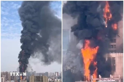 Video tòa nhà chọc trời cháy dữ dội ở Trung Quốc, khói cao hàng km