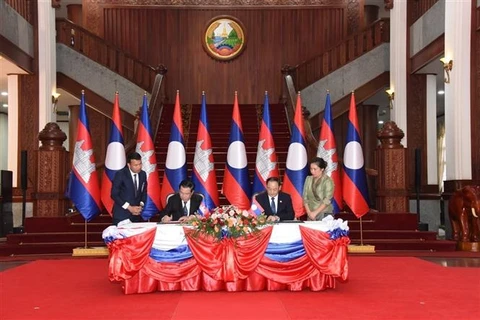 Đảng Nhân dân Cách mạng Lào và Đảng Nhân dân Campuchia tăng hợp tác