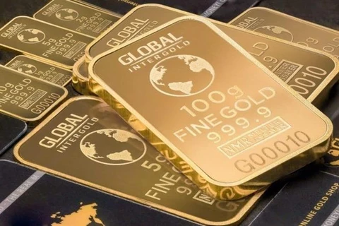 Giá vàng thế giới tăng trong phiên 27/2 khi đồng USD giảm giá