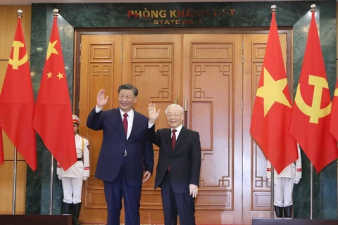 Tổng Bí thư Nguyễn Phú Trọng và Tổng Bí thư, Chủ tịch nước Trung Quốc Tập Cận Bình chụp ảnh chung. (Ảnh: Phương Hoa/TTXVN)
