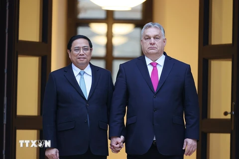 Thủ tướng Phạm Minh Chính và Thủ tướng Hungary Viktor Orbán. (Ảnh: Dương Giang-TTXVN)