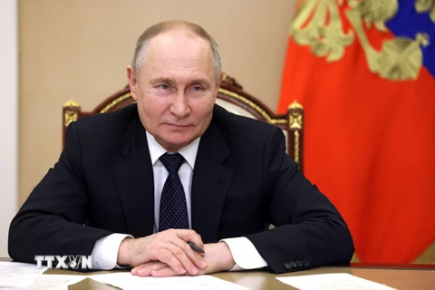 Tổng thống Nga Vladimir Putin tại cuộc họp trực tuyến ở Moskva. (Ảnh: AFP/TTXVN)