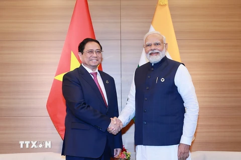 22. Thủ tướng Phạm Minh Chính gặp Thủ tướng Ấn Độ Narendra Modi (Nhật Bản, 20/5/2023). (Ảnh: Dương Giang/TTXVN)