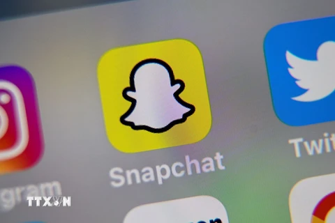 Biểu tượng Snapchat trên màn hình điện thoại. (Ảnh: AFP/ TTXVN)