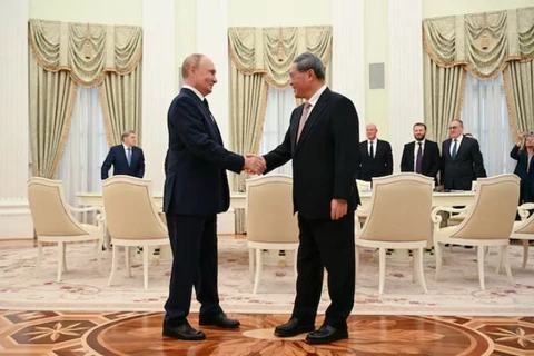 Tổng thống Nga Vladimir Putin và Thủ tướng Trung Quốc Lý Cường (Ảnh: Reuters)