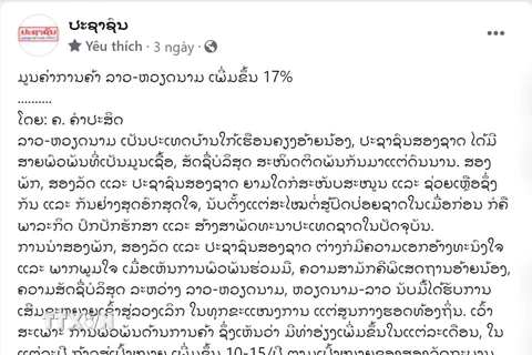 Bài viết trên báo Pasaxon đề cập quan hệ thương mại Việt Nam-Lào giúp đạt mục tiêu tăng trưởng mà Chính phủ hai nước đề ra. (Ảnh: Xuân Tú/TTXVN