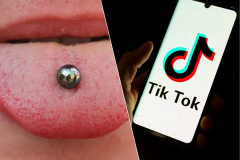 "Thử thách xỏ khuyên" được lan truyền trên mạng xã hội TikTok.. (Ảnh: AFP)