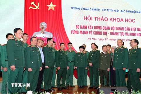 Thượng tướng, Tiến sỹ Lê Huy Vịnh, Thứ trưởng Bộ Quốc phòng, và các đại biểu dự hội thảo. (Ảnh: Trọng Đức/TTXVN)