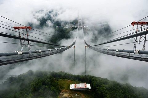 Công trình cầu treo này sẽ được bắc qua sông Long Giang, tỉnh Vân Nam, Trung Quốc. (Nguồn: CCTVNews)