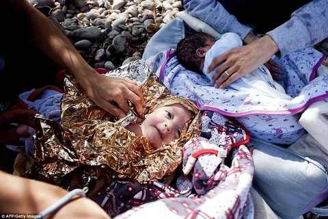 Một đôi vợ chồng Syria đã mạo hiểm mạng sống của mình và hai đứa con sinh đôi mới 8 tháng tuổi để tới Hy Lạp.