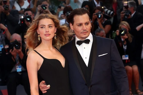 Cặp vợ chồng diễn viên nổi tiếng Johnny Depp và Amber Heard. (Nguồn: popsugar.com)