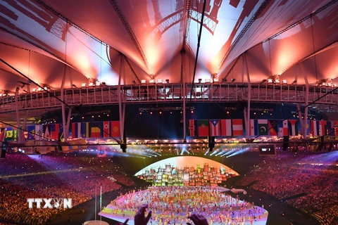 Màn trình diễn nghệ thuật tại lễ khai mạc Olympic Rio 2016 trên sân Maracana ngày 5/8. (Nguồn: AFP/TTXVN)